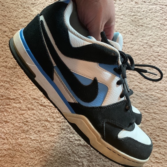light blue and black nike shoes